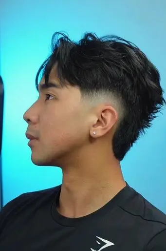 Client checking his finished haircut in the mirror