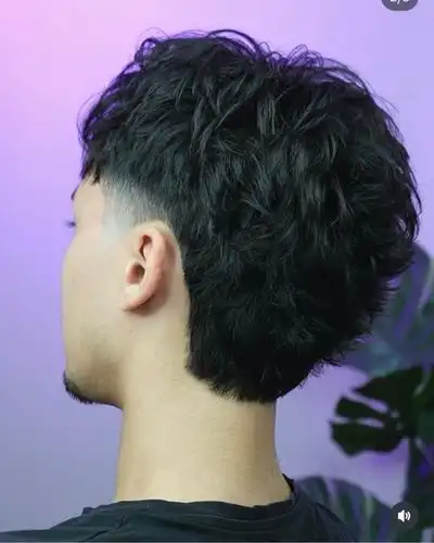 Mid fade haircut with clean blend by a springvale barber