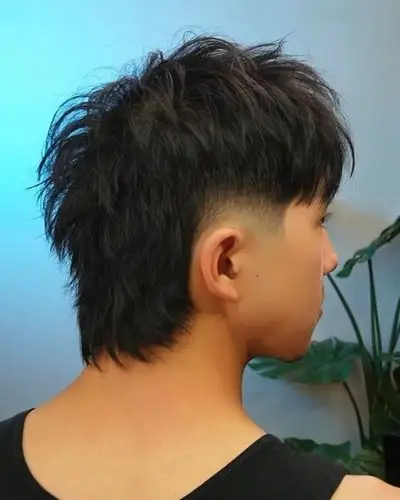 Scissor cut men's hairstyle with clean natural flow