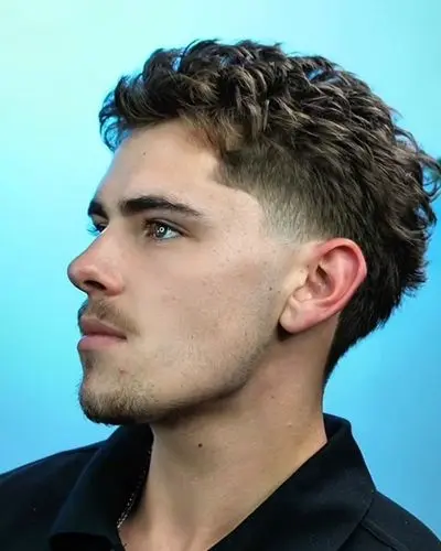 Side profile showing a sharp taper fade